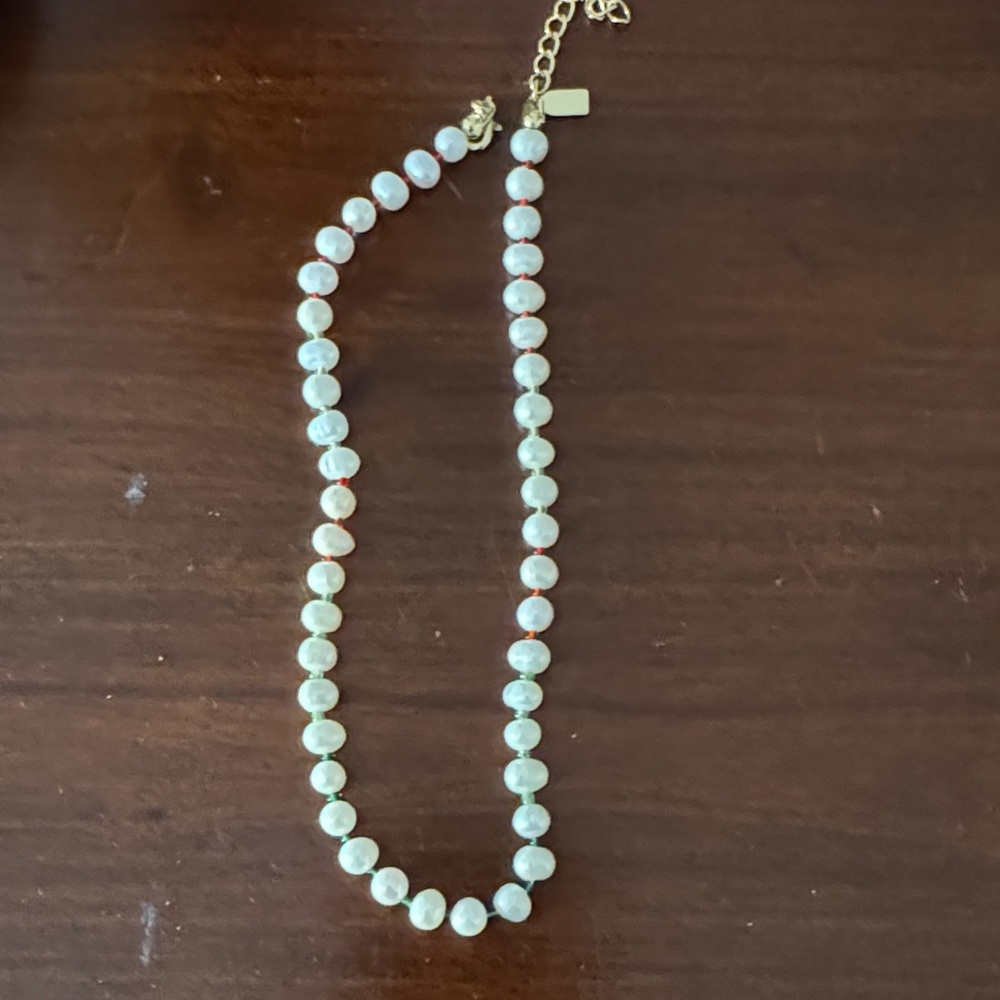 Elegant Pearl Necklace with Gold Accents